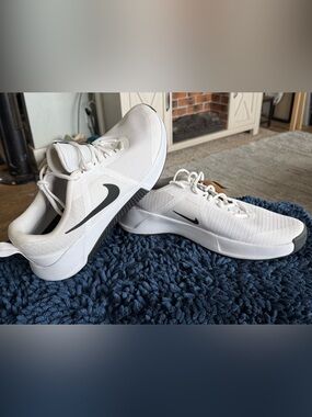 Nike Men’s White Athletic Sneakers with Black Swoosh